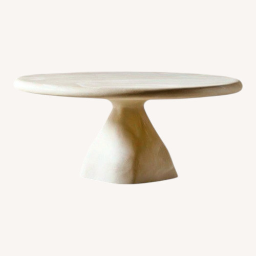 Used CB2 Espira 35" Round Cream Marbled Resin Coffee Table for sale on AptDeco