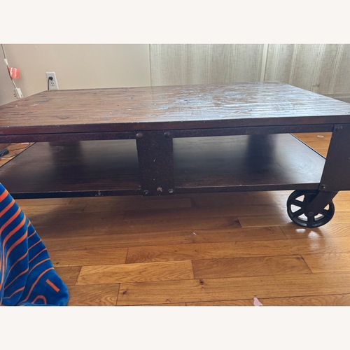 Used Raymur & Flanigan Wood Coffee Table  for sale on AptDeco