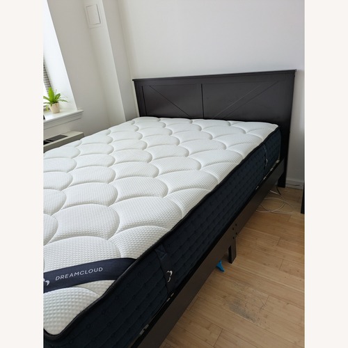 Used Winston Porter Dark Brown Wood Queen Bed for sale on AptDeco