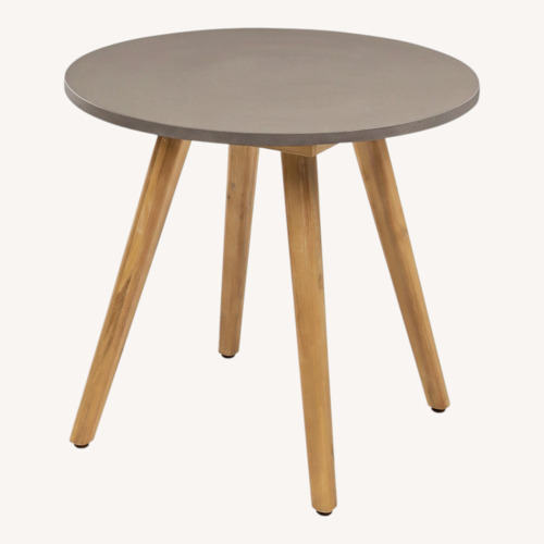 Used Article Light Gray Wood Dining Table for sale on AptDeco
