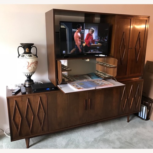 Used Homestyles Furniture Dark Brown Wall Unit for sale on AptDeco
