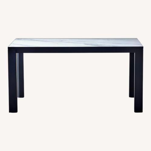 Used CB2 Nobasu White Extendable Dining Table for sale on AptDeco