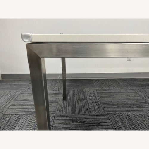 Used Room & Board Parsons White Quartz Dining Table 2 for sale on AptDeco