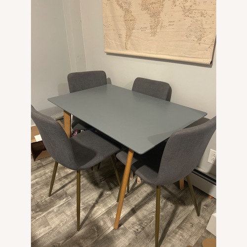 Used Blue Gray Dining Table and Chair for sale on AptDeco