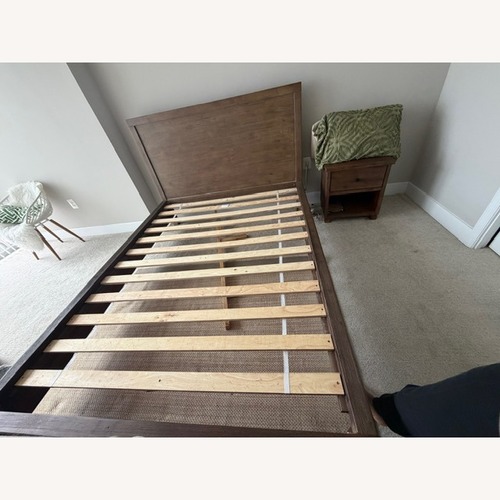 Used Macy's Canyon Light Brown Wood Queen Bed for sale on AptDeco