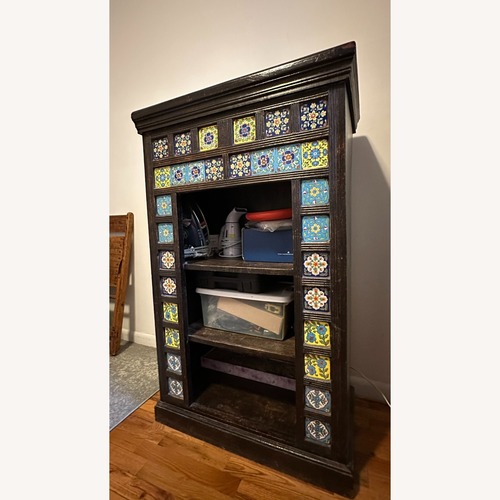 Used Vintage/Antique Dark Brown Wood Armoire for sale on AptDeco