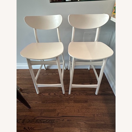 Used West Elm Classic Cafe White Wood Counter Stools for sale on AptDeco