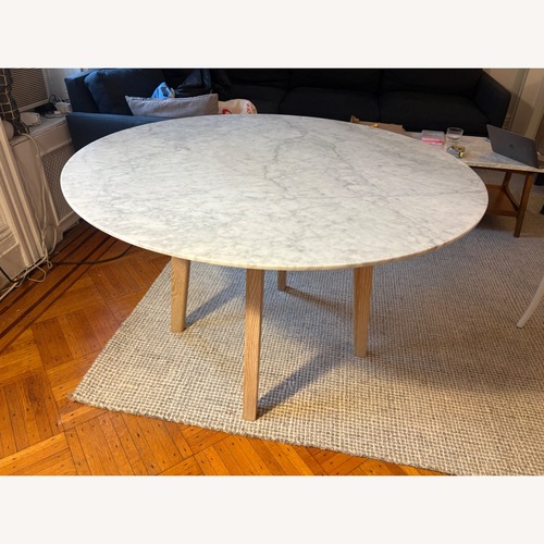 Used Crate & Barrel White Dining Table for sale on AptDeco