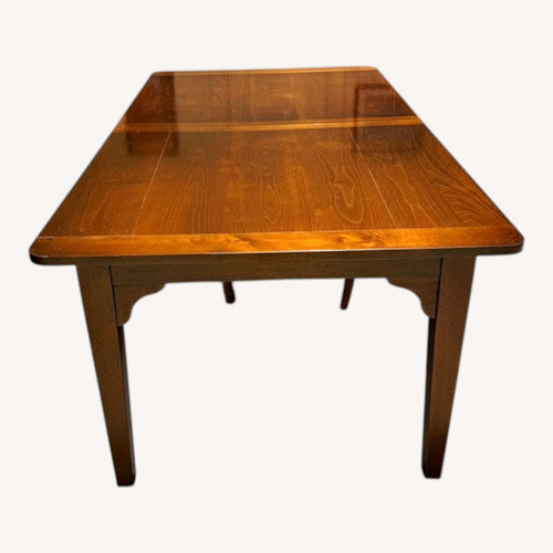 Used Grange Dark Brown Dining Table for sale on AptDeco