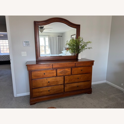Used Dark Brown Wood Dresser for sale on AptDeco