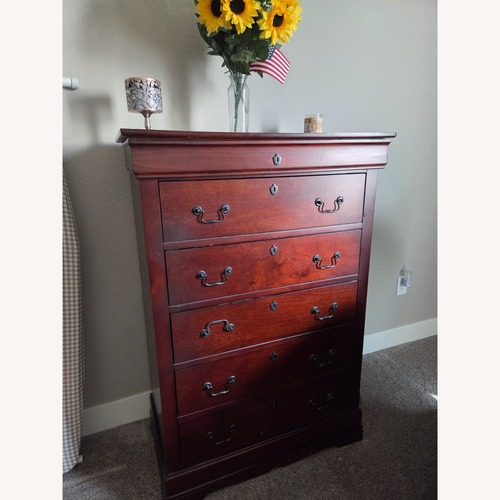 Used Ashley Furniture Alisdair Dark Brown Wood Chest for sale on AptDeco