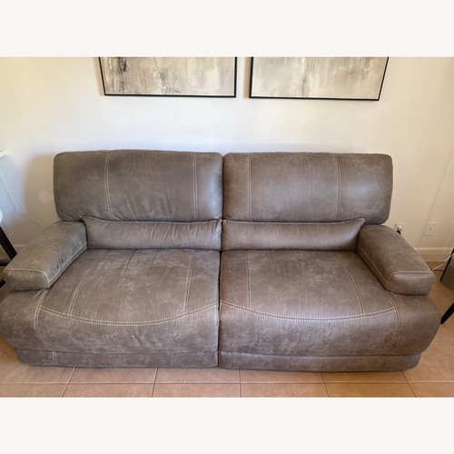 Used Cindy Crawford Home Auburn Hills Mushroom Leather Power Reclining Sofa for sale on AptDeco