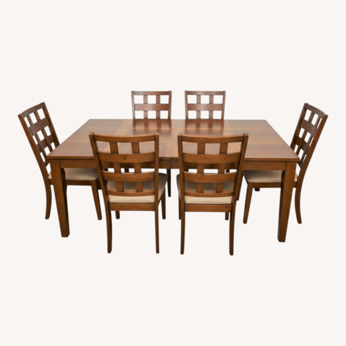 Used Living Spaces Dining Table for sale on AptDeco