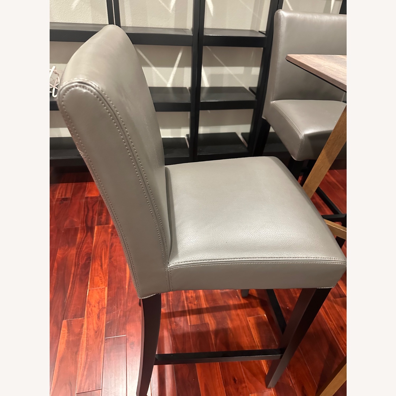 Crate & Barrel Dark Gray Leather Dining Chairs - image-3