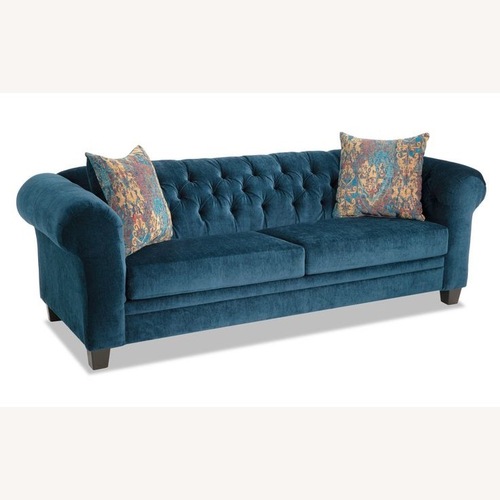 Used Queen Sleeper Sofa with Vintage Style Pillows for sale on AptDeco