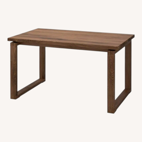 Used IKEA Dark Brown Wood Dining Table for sale on AptDeco