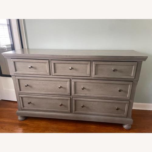 Used Ashley Furniture Lettner Light Gray Wood Dresser for sale on AptDeco
