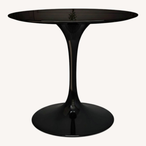 Used Tulip Fiberglass Dining Table , 36" Round Black for sale on AptDeco