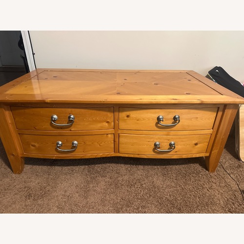 Used Rooms To Go Gold Coffee Table for sale on AptDeco