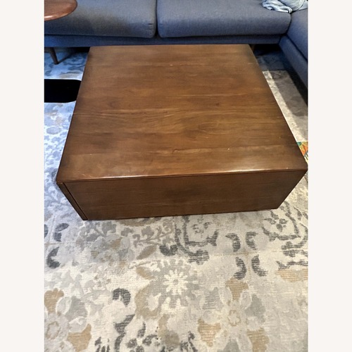 Used Pottery Barn Parkview Dark Brown Square Coffee Table  for sale on AptDeco