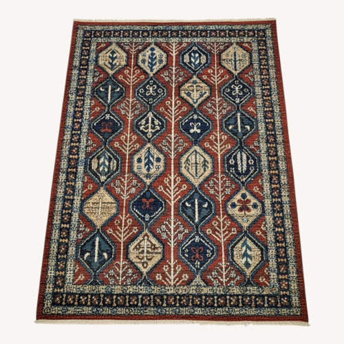 Used 6' x 9' Rust Red Rug for sale on AptDeco
