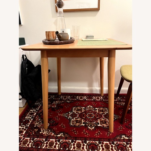 Used Wayfair Bednarz Pine Solid Wood Dining Table for sale on AptDeco