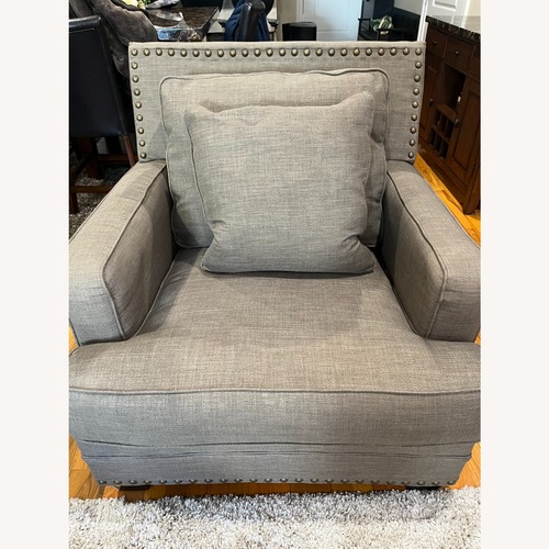 Used Ashley Furniture Dark Brown Armchair for sale on AptDeco