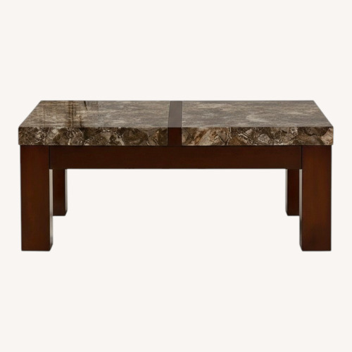 Used Ashley Furniture Kraleene Dark Brown Coffee Table for sale on AptDeco
