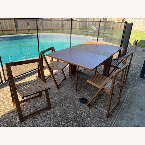 Used Vintage/Antique Dark Brown Dining Table for sale on AptDeco