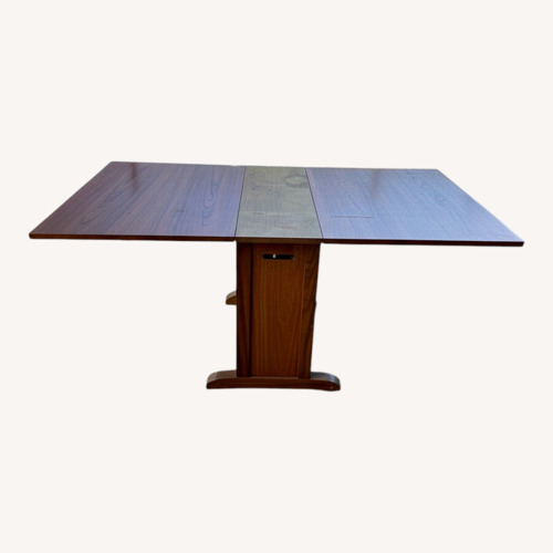 Used Vintage/Antique Dark Brown Dining Table for sale on AptDeco