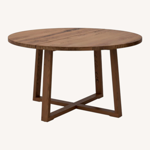 Used Moerbylanga Round Dining Table 57" for sale on AptDeco