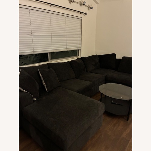 Used Living Spaces Dark Gray Fabric 3+ Piece Sectional for sale on AptDeco
