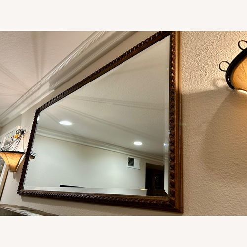 Used Carved and Beveled Wood Framed Wall Mirror for sale on AptDeco