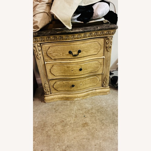 Used Ashley Furniture Dark Brown Marble Dresser for sale on AptDeco