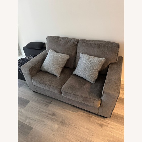 Used Ashley Furniture Bristaview Light Gray Fabric Loveseat for sale on AptDeco