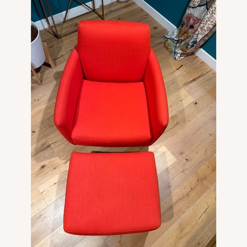 Used CB2 Parlour Atomic Orange Chair & Ottoman for sale on AptDeco