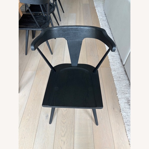 Used LuxeDecor Globetrotter Black Wood Dining Chairs for sale on AptDeco