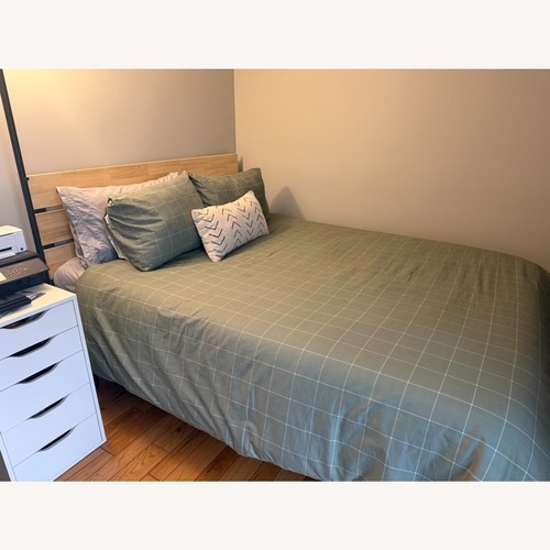 Used Zinus Queen Bed Frame  for sale on AptDeco