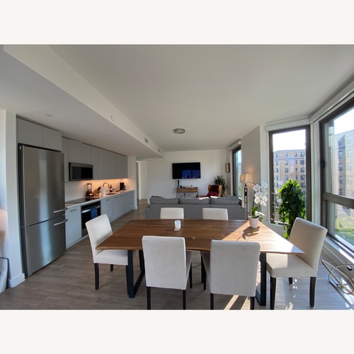 Used Room & Board Chilton Dark Brown Wood Dining Table for sale on AptDeco