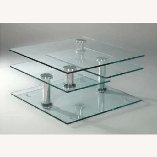 Used Raymour & Flanigan Transparent Glass Coffee Table for sale on AptDeco