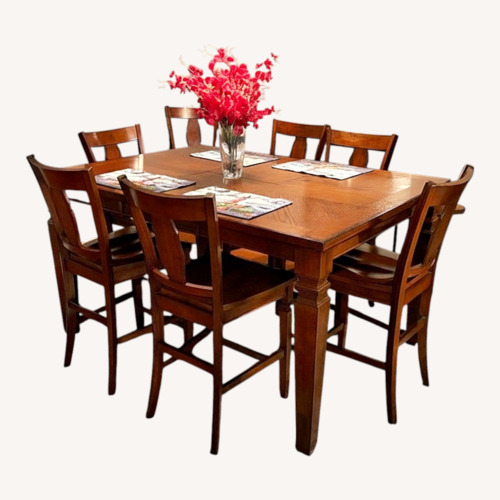 Used Ashley Furniture Dark Brown Dining Table for sale on AptDeco
