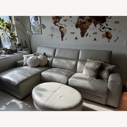 Used Macy's Nevio Leather Sofa + Ottoman for sale on AptDeco