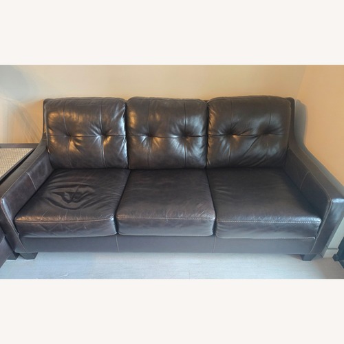 Used Ashley Furniture Dark Brown Leather Sleeper Sofa for sale on AptDeco