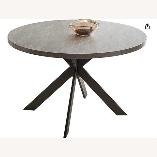 Used Amazon Light Gray Dining Table for sale on AptDeco