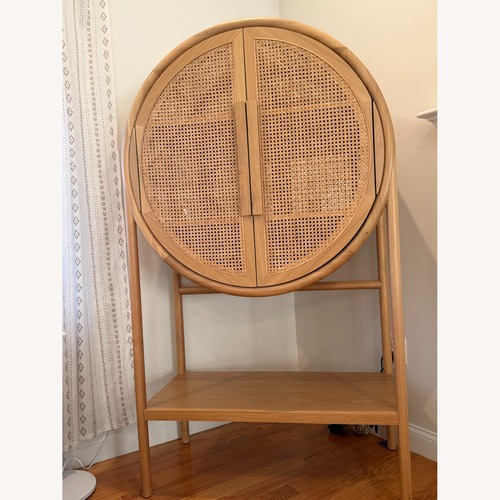 Used Crate & Barrel Natural Cane Bar Cabinet for sale on AptDeco