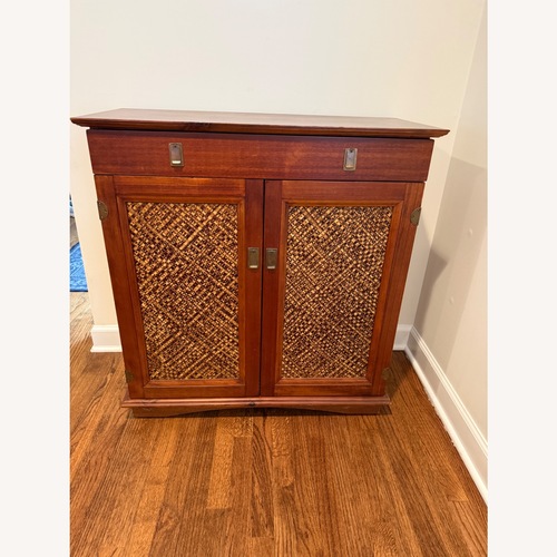 Used Pier 1 Imports Dark Brown Wood Sideboard for sale on AptDeco