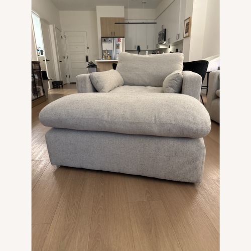 Used Ashley Furniture Natural Fabric Ottoman for sale on AptDeco