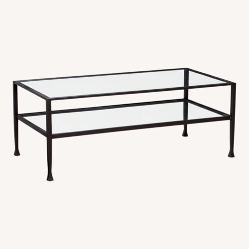 Used Pottery Barn Tanner Black Glass Coffee Table for sale on AptDeco