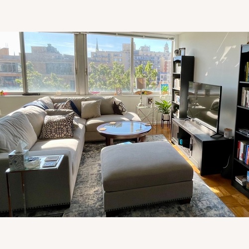 Used Bassett Dark Brown Glass Coffee Table for sale on AptDeco