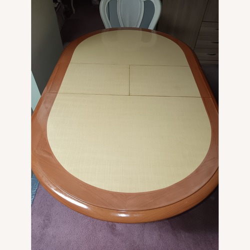 Used Wood Dining Table for sale on AptDeco